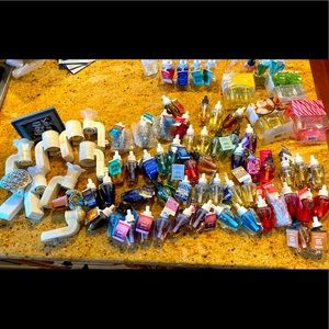 HUGE lot of Bath and Body Wallflowers and Plug Ins. 59 labeled 7 not labeled